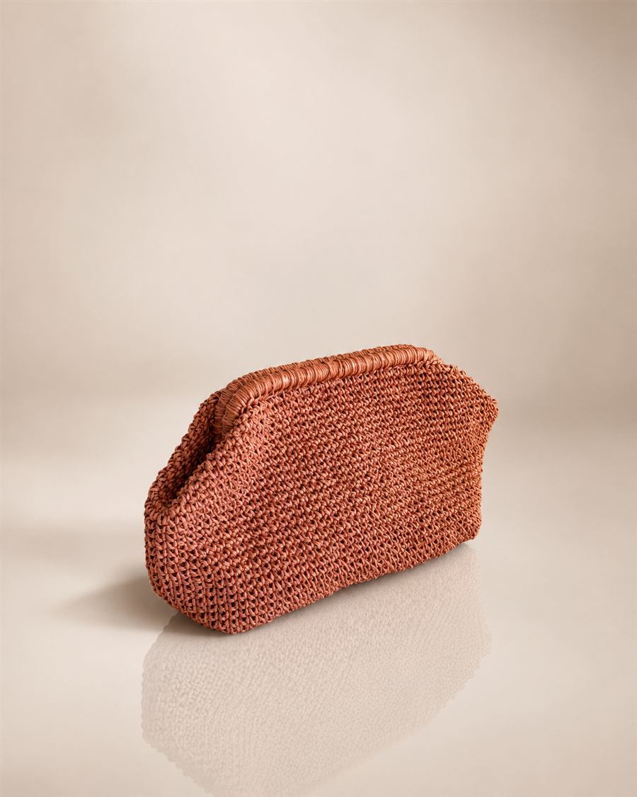 Terracotta handwoven raffia clutch bag