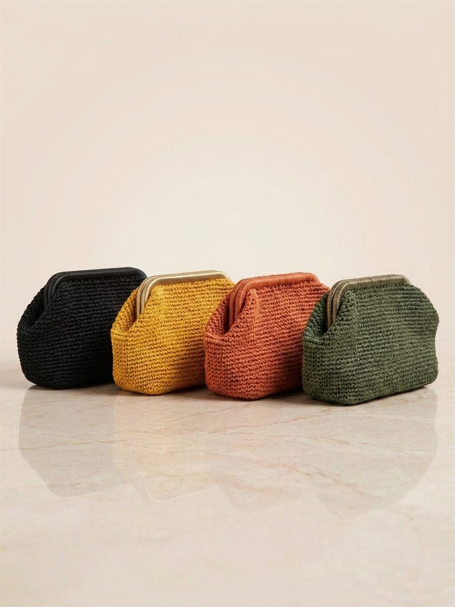Handwoven raffia clutch bags in black, mustard, terracotta and olive