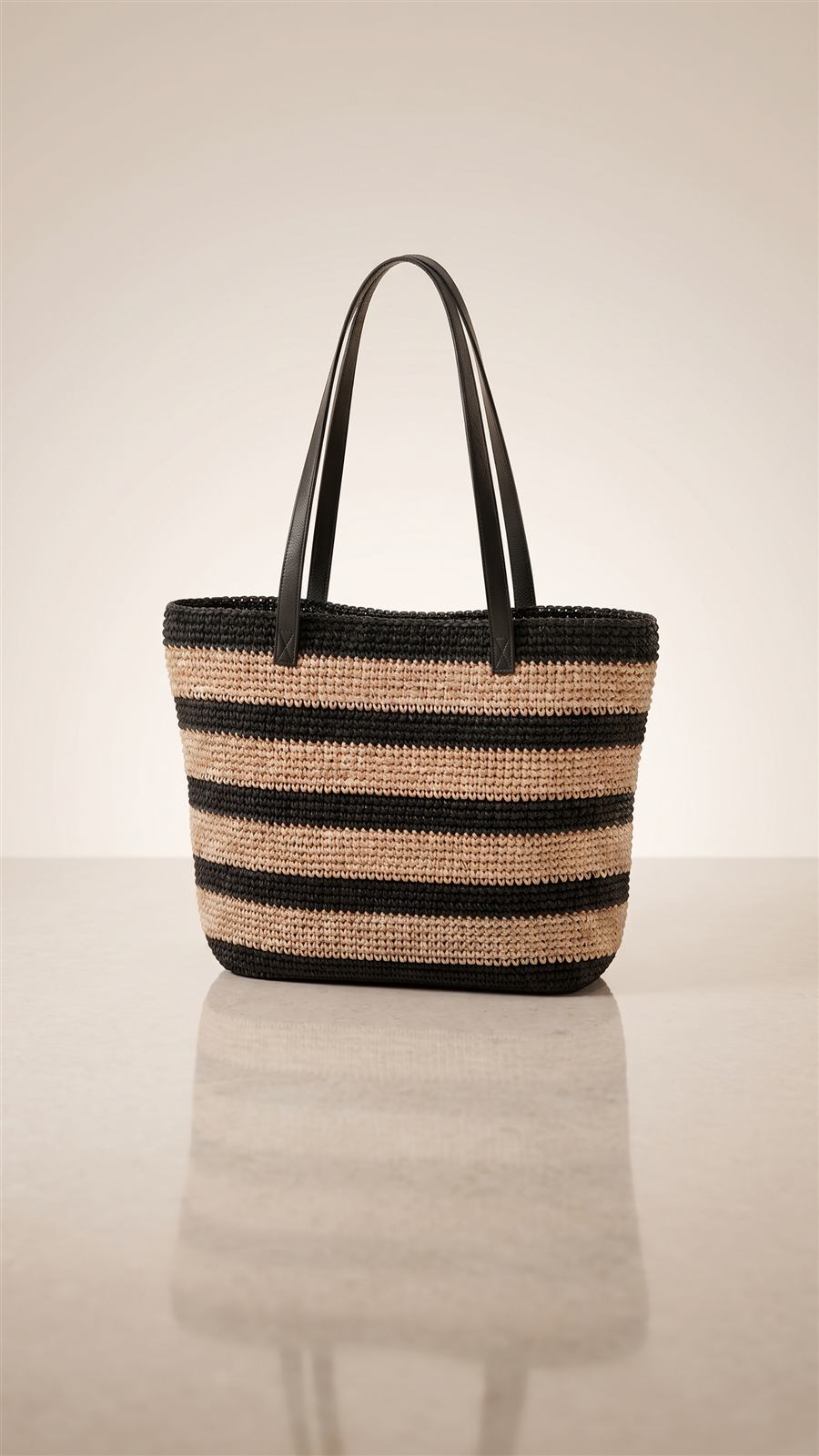 Striped black and natural raffia tote bag with leather handles